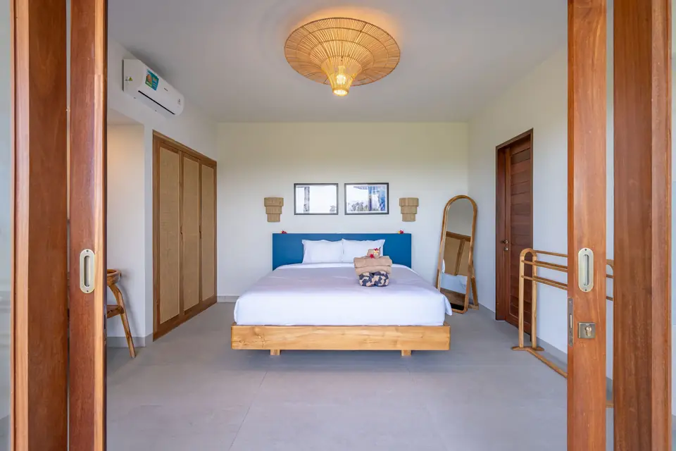 Casa Azul bedroom with king bed and blue headboard