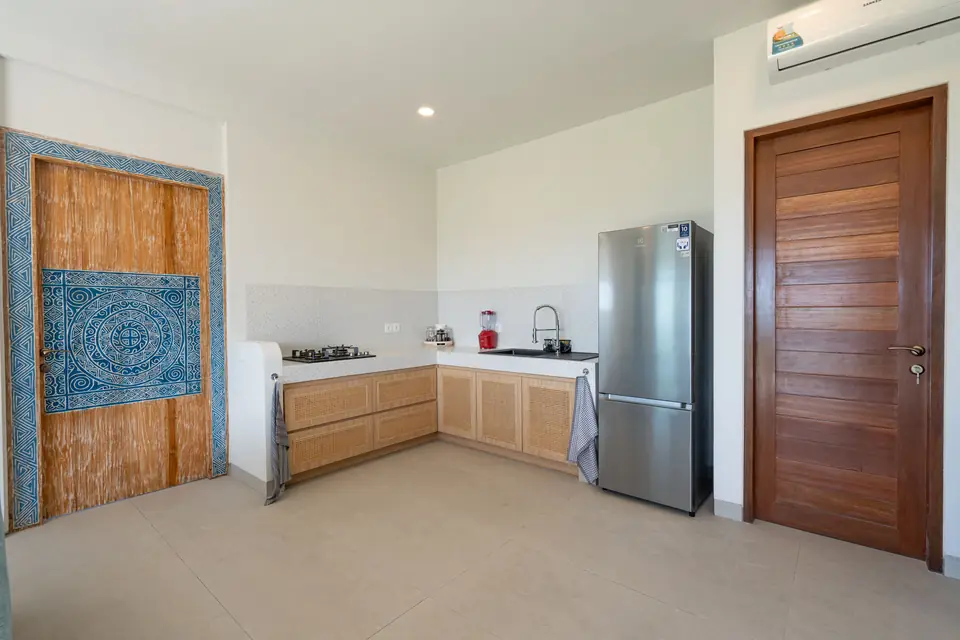 Casa Azul kitchen with full-size fridge and gas hob